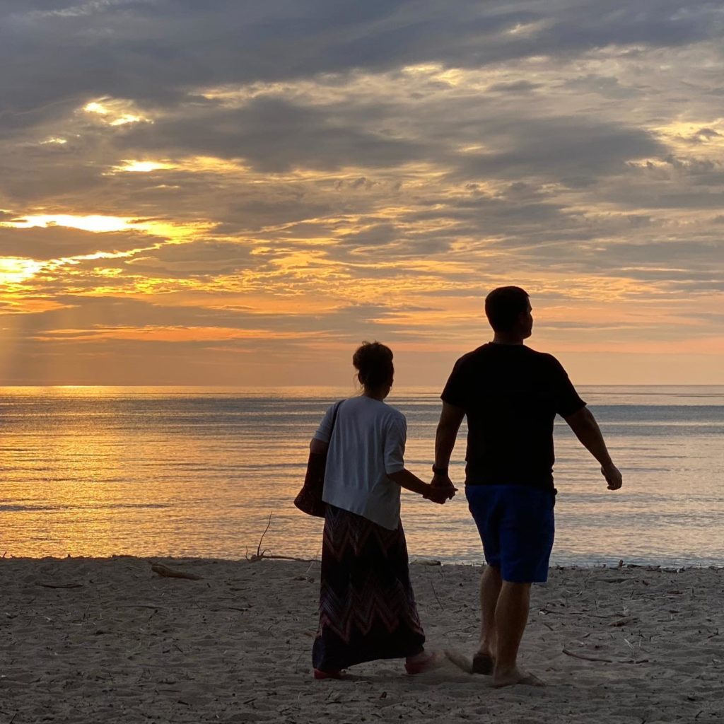 couple walking on beach